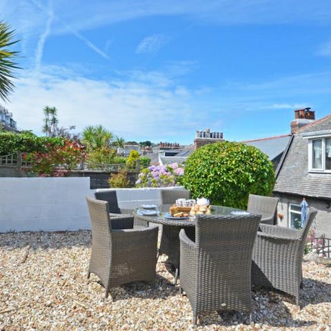 Take your breakfast on the private terrace and watch the clouds go by