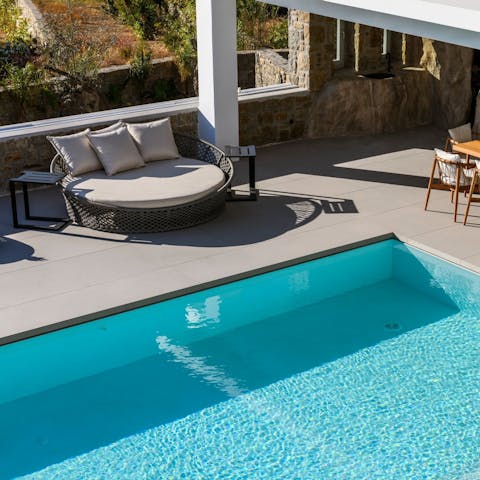 Jump into your private pool then dry off in the sun on a day bed
