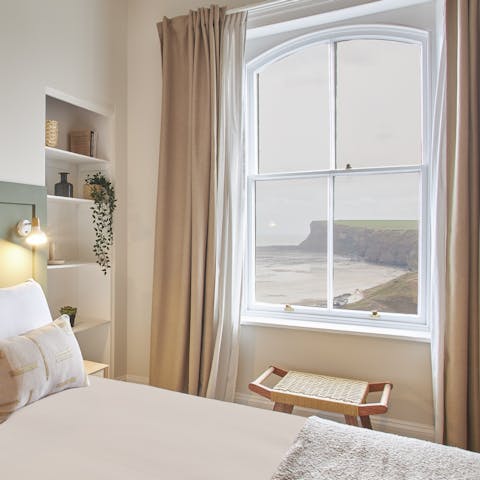 Wake up to stunning coastal views