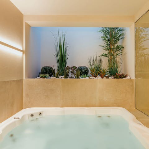Sit back and relax amid the bubbles of the hot tub