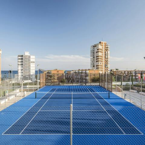 Challenge a loved one to a game of tennis on the communal courts