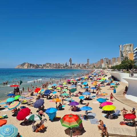 Spend a day on the sands of Playa de Poniente, a short walk away
