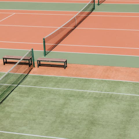 Enjoy a game of tennis in Ravenscourt Park, a five-minute walk away