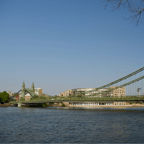 Visit the storied Hammersmith Bridge, a thirty-minute walk away