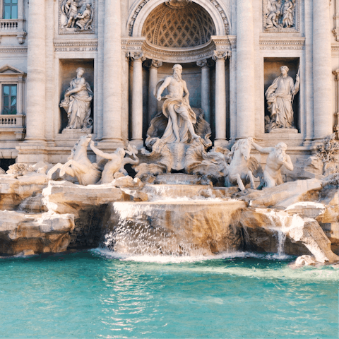 Marvel at the Trevi Fountain, a three-minute walk away