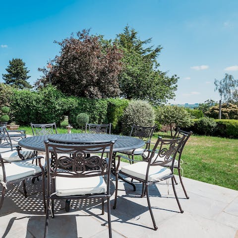 Relax on the large terrace in your private garden after a day exploring Bitton