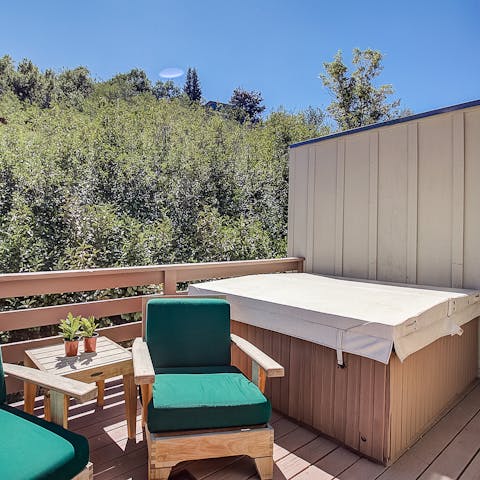 Soak in the rooftop hot tub or relax in the lounger after a day of snowsports