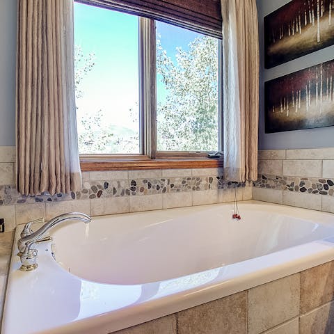 Relax in the Jacuzzi bathtub in the master ensuite
