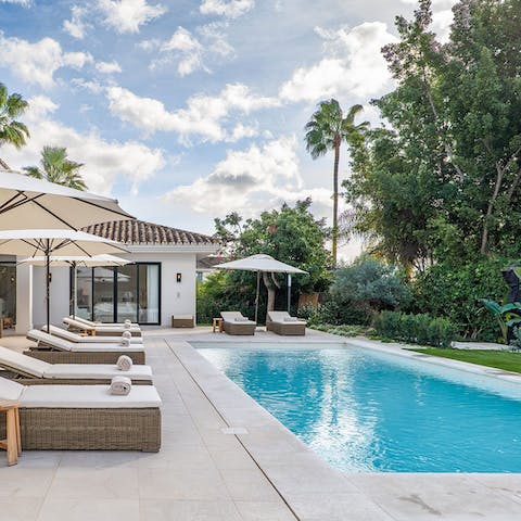 Work on that perfect tan by the private pool 