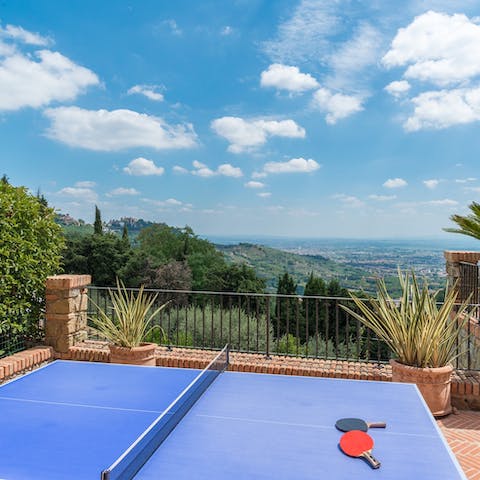 Play table tennis on the terrace while trying not to get distracted by the view