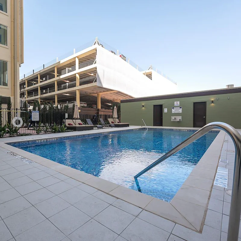 Take a refreshing dip in the shared swimming pool