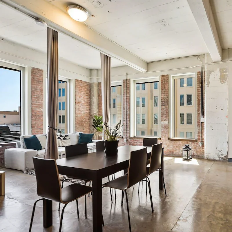 Host a dinner party in the sleek dining area