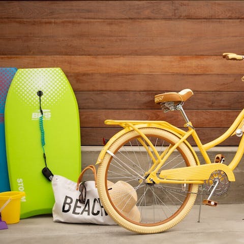 Have endless beachside fun with the bicycles and boogie boards provided