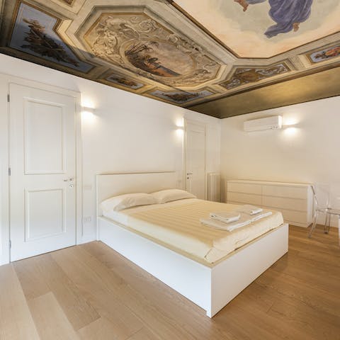 Fall asleep beneath the bedroom's ornate frescoed ceiling