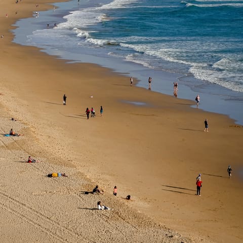 Walk to nearby Praia da Rocha to swim in the sea