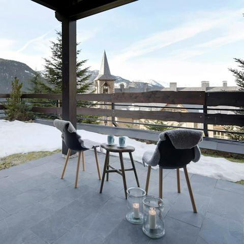 Enjoy your coffee on the large terrace overlooking the mountains