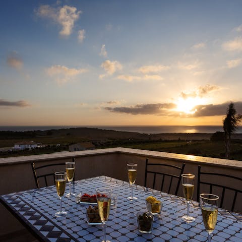 Catch a sunset from the terrace, complete with a glass of fizz