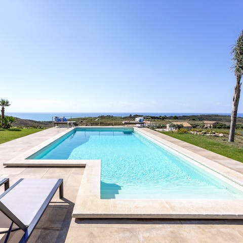 Immerse yourself in the spectacular scenery in the private pool