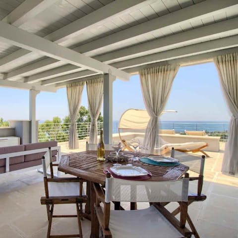 Tuck into breakfast while soaking up views of the Mediterranean Sea