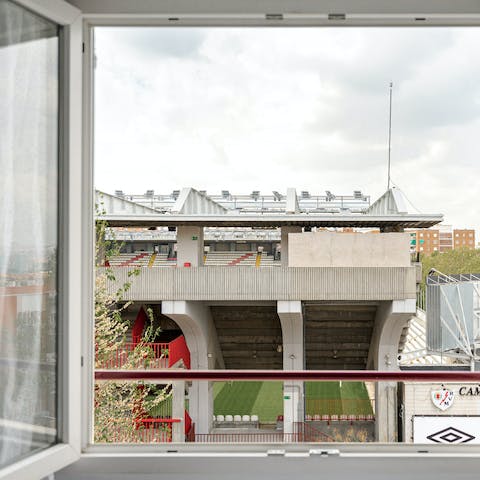 Stay beside the Estadio de Vallecas stadium, where you can watch the game from the living room window