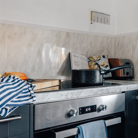Whip up a delicious homecooked dinner in the sleek kitchen or treat yourself to a fish and chip takeaway