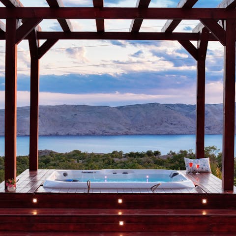 Unwind with a cocktail as you watch the sunset from the hot tub