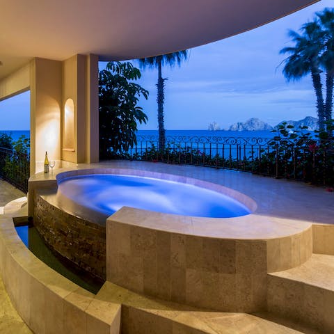 Watch the sunset from your private jacuzzi hot tub overlooking the Pacific Ocean