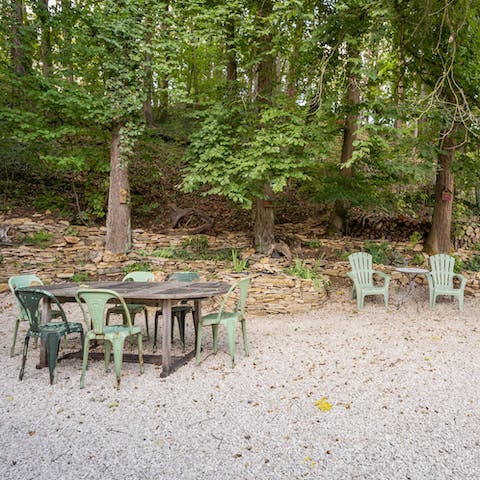 Sit down to an alfresco meal with the woods providing a scenic backdrop
