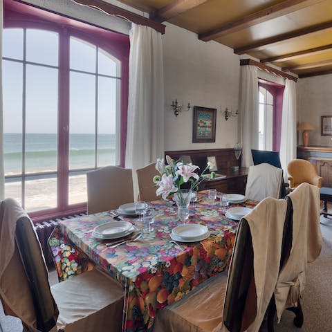 Serve up some fresh local fare at the dining area overlooking the beach