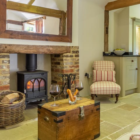 Relax in front of the wood-burning stove when the Sussex weather turns cold