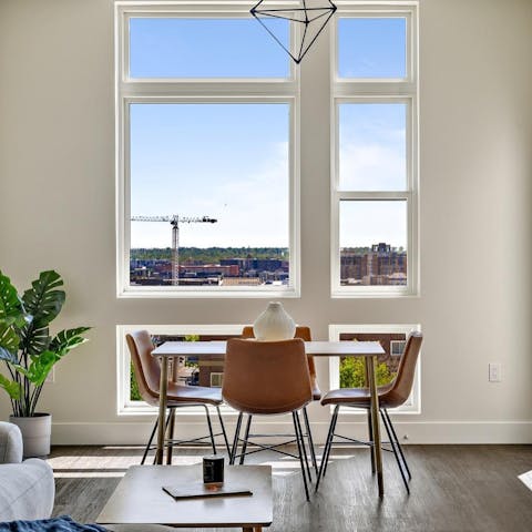 Sit down to a meal while feasting on Denver vistas from the living room's floor-to-ceiling windows