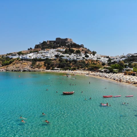 Discover the picturesque alleys, spectacular views and beautiful beaches of Lindos