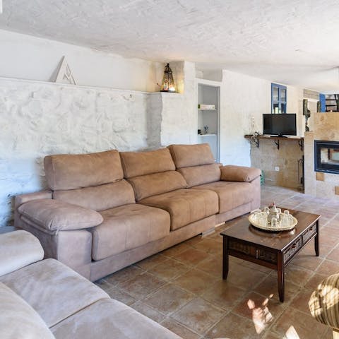Unwind in the cosy living space with your morning cup of coffee