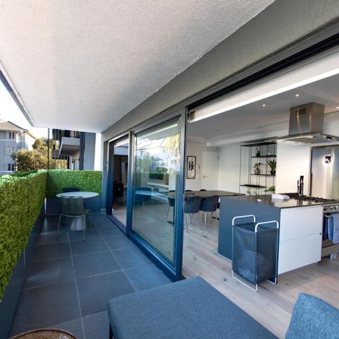 Enjoy alfresco dining at its finest with open-plan living and  private balcony