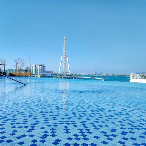 Spend afternoons diving into the panoramic-viewed pool