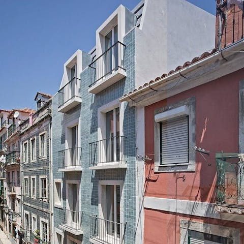 Admire the colourful, blue facade of your Bairro Alto apartment
