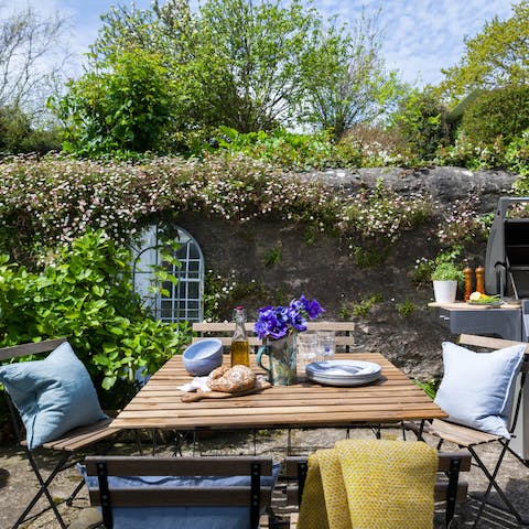 Enjoy sunny breakfasts and alfresco barbecues in the beautiful garden
