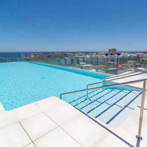 Slip into the rooftop pool for stunning ocean views