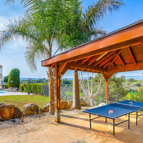 Watch the sun go down as you enjoy a game of ping pong in the garden 