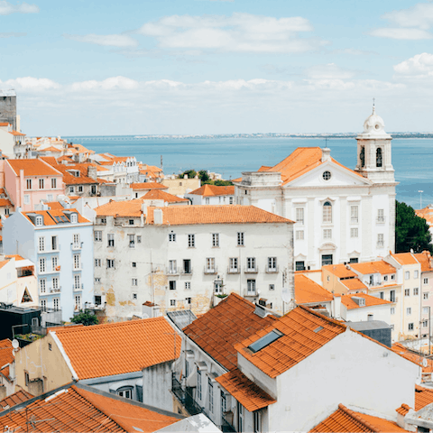 Explore the attractions of Lisbon, such as São Jorge Castle, a 15-minute walk away