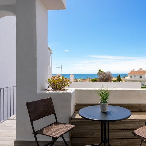 Soak up the sea views with morning coffees on the private balcony
