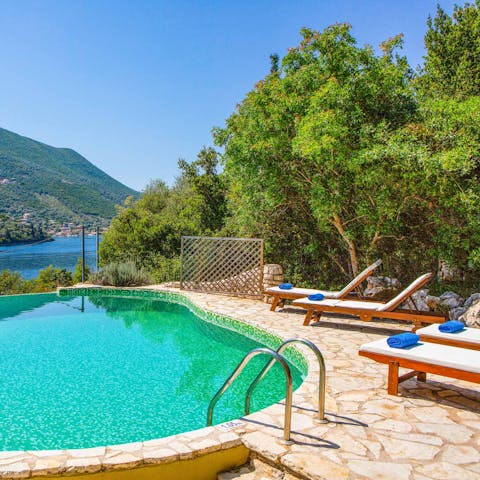 Spend long lazy days lounging poolside in the Greek sun