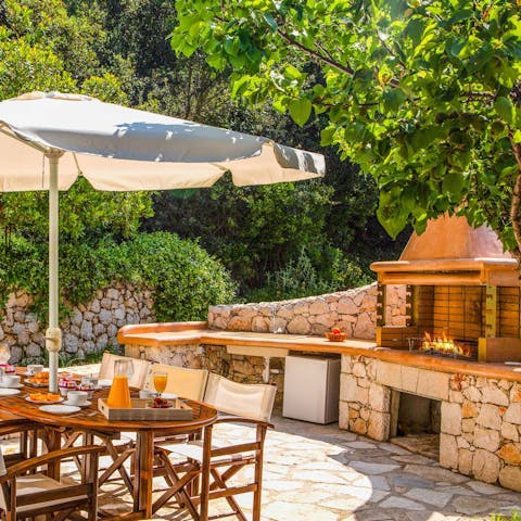 Enjoy Greek salad and souvlaki on the outdoor dining area