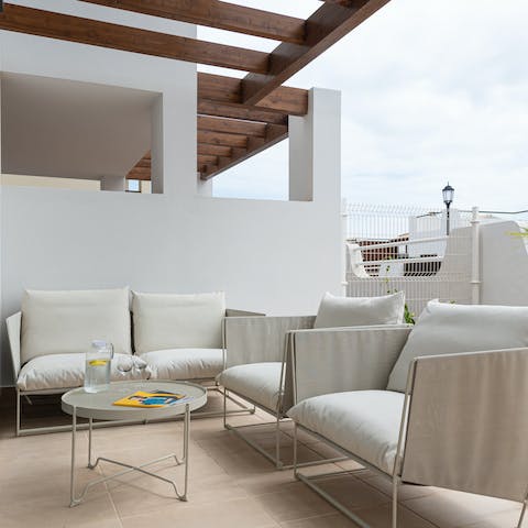 Enjoy evening cocktails on your patio, comfy in the outdoor sofa set, before heading out for dinner