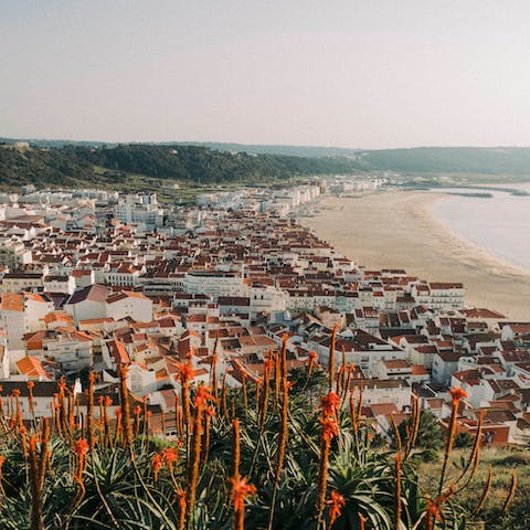 Soak up the sun on Praia de Faro, a short drive or ferry away