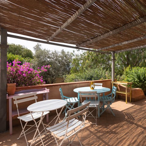 Serve up antipasto and chilled white wine out on the covered terrace