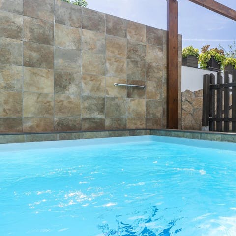 Take a refreshing dip in the private pool after snoozing on a sun lounger