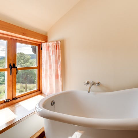 Relax in the beautiful freestanding bathtub