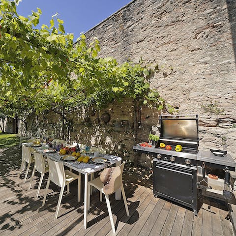 Get lunch grilling on the barbecue and enjoy it alfresco in the shade