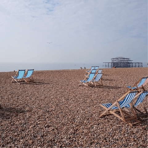 Grab yourself a deckchair and soak up some rays, Brighton Beach is just a five-minute walk away